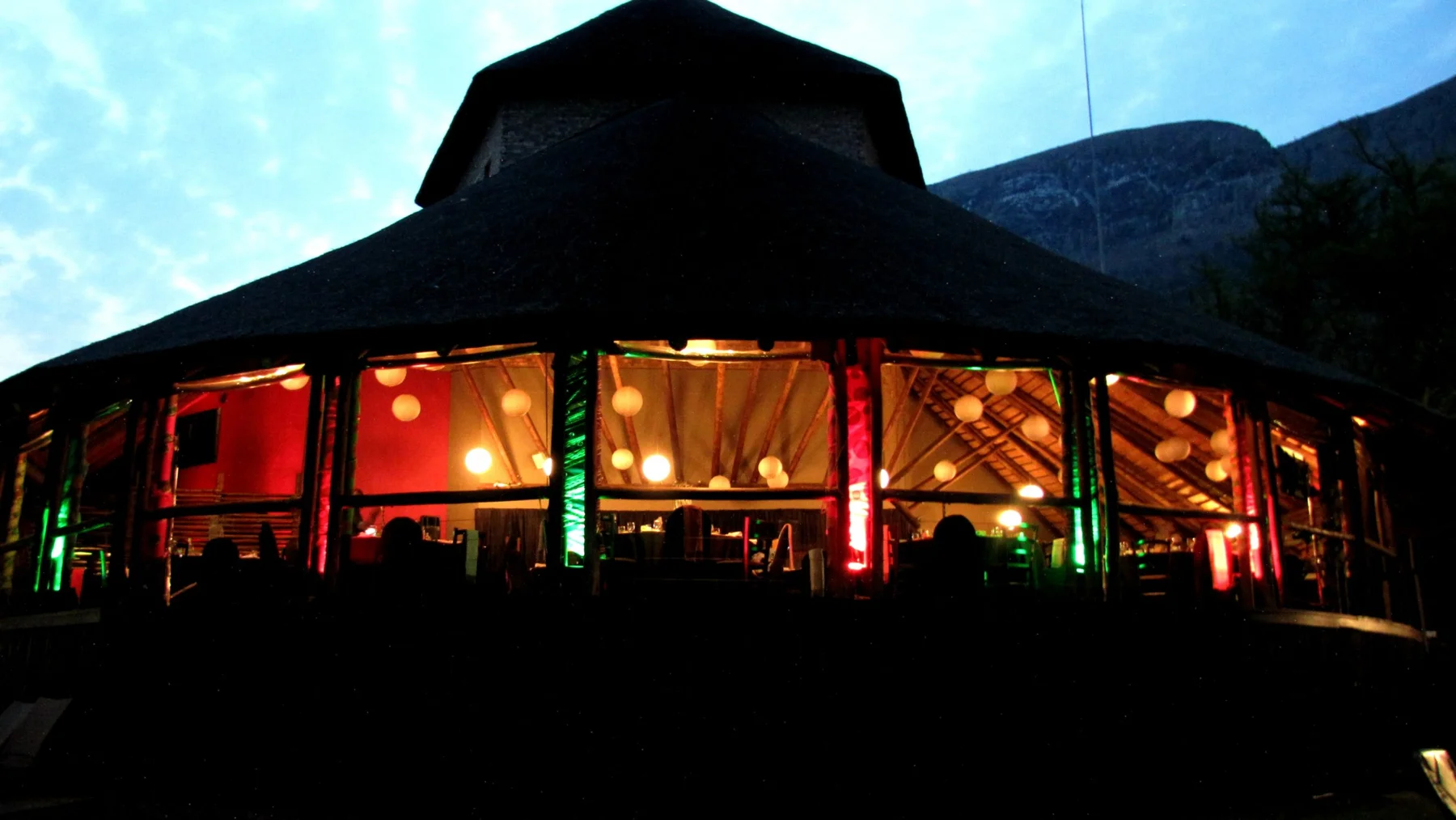 Illuminated lodge at dusk