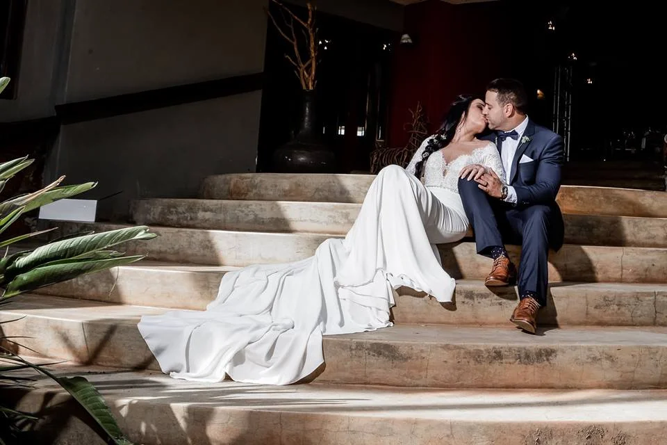 Wedding couple on the lodge steps